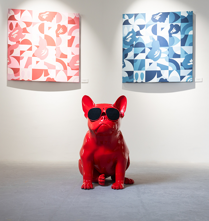 User with Guitar and Bulldog Speaker